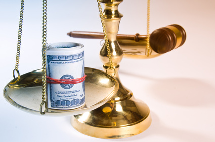 Wooden justice gavel and block with brass